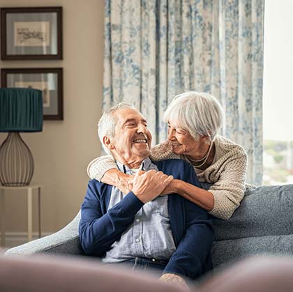 Old couple with dementia smiling