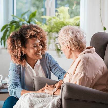 Young woman carer and older woman